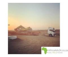 30 Ton Lowbed Trailer Abnormal Load Transport for Hire Call 0720345219 in North West and KZN